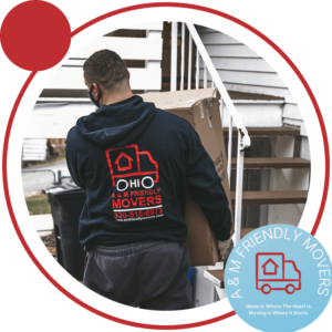Professional mover with chair and boxes