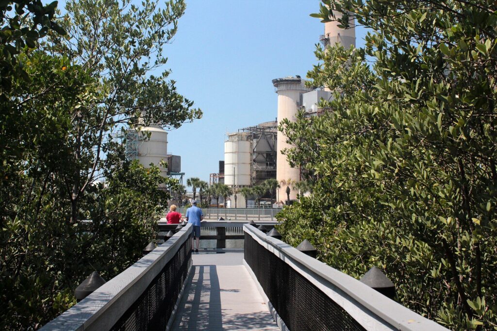 Boardwalk at the Manatee Viewing Center in Apollo Beach, Florida, with Big Bend Power Station behind
