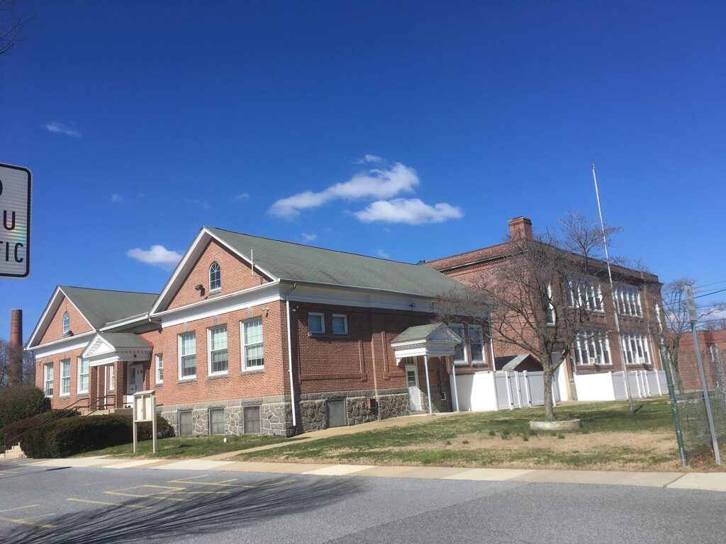 Elsmere, Delaware town hall and police station, a brick building on a sunny day