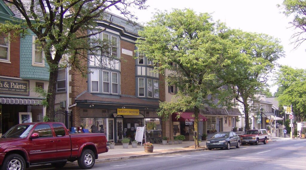 Tree-lined State Street with shops in downtown Kennett Square, Pennsylvania
