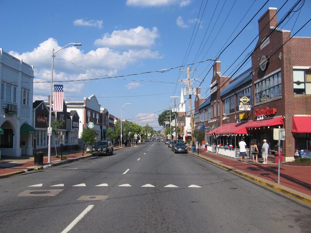 Main Street in downtown Newark, Delaware, lined with brick shops and restaurants