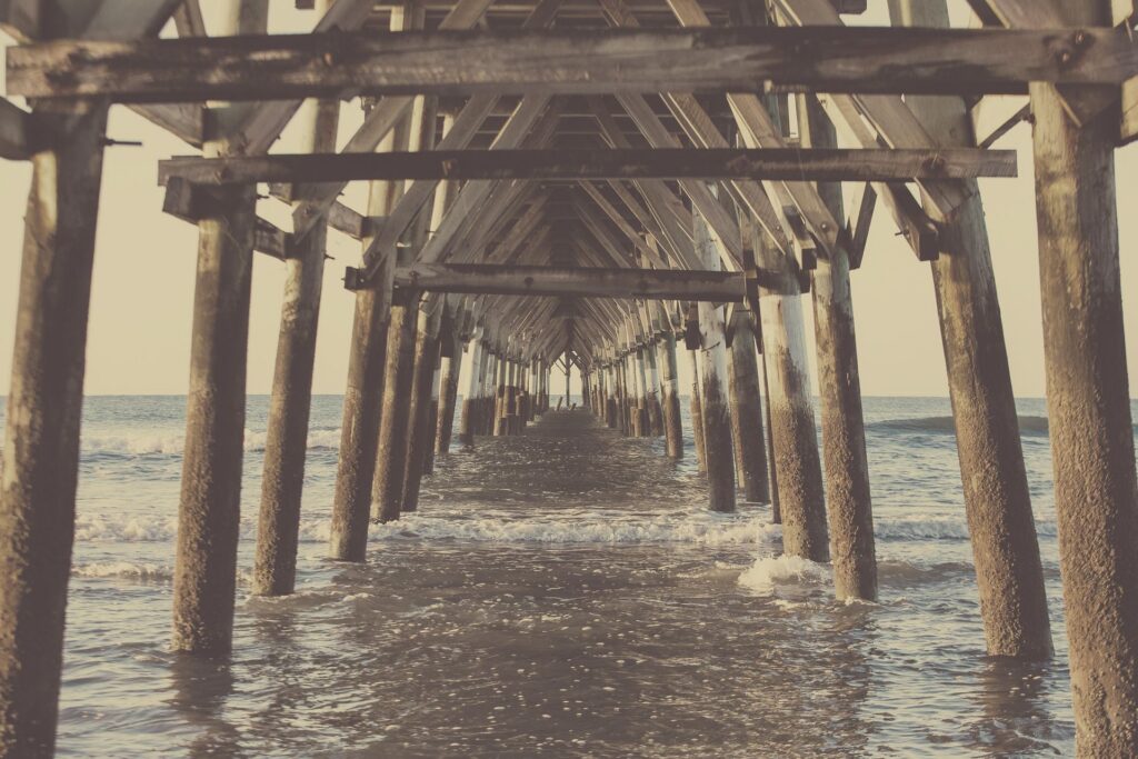 View under a wooden pier in North Myrtle Beach, South Carolina