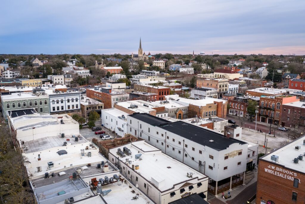 Aerial view of historic downtown Wilmington, NC showcasing urban architecture and church spires